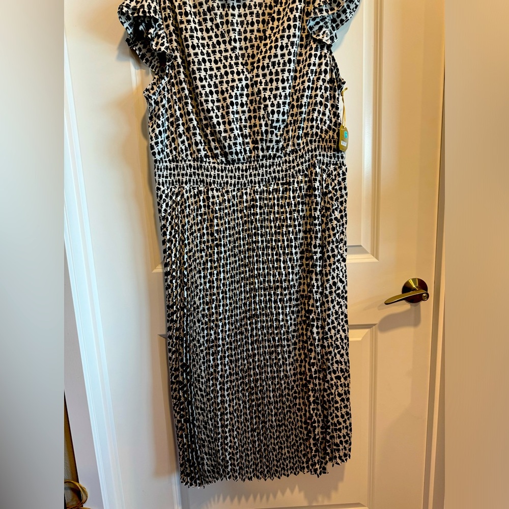 Perfume bottle dress with pleated skirt